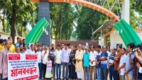 বড়পুকুরিয়া কয়লা খনিতে স্থায়ী নিয়োগের দাবিতে মানববন্ধন